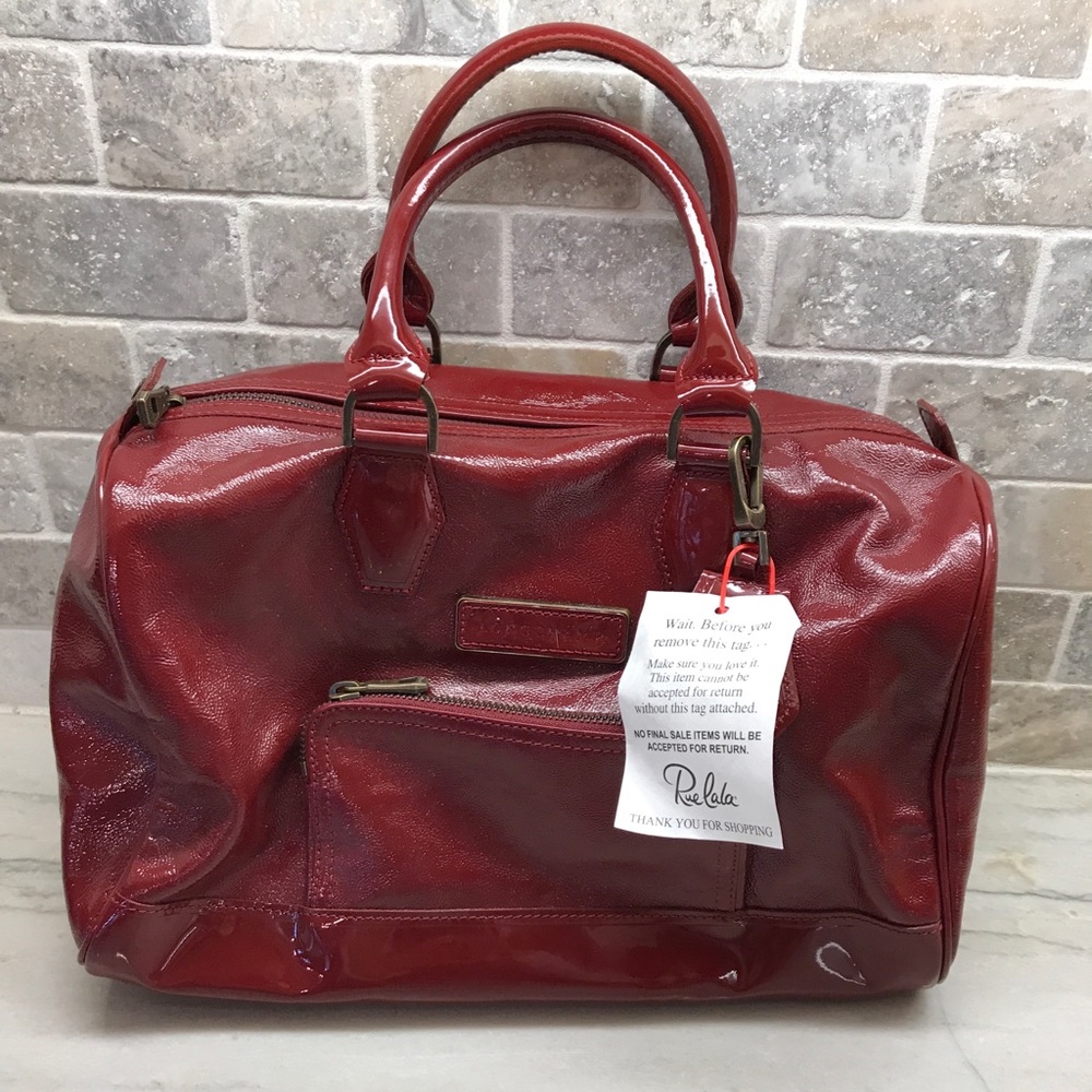 New with tags still attached Longchamp handbag.